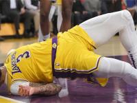 星空体育中国官网-NBA球员受伤下场，球队一度落后